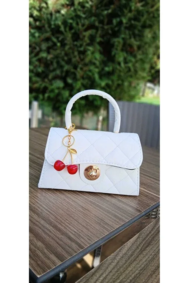 Box Baklava slice Gold chain detail Cherry charm gift