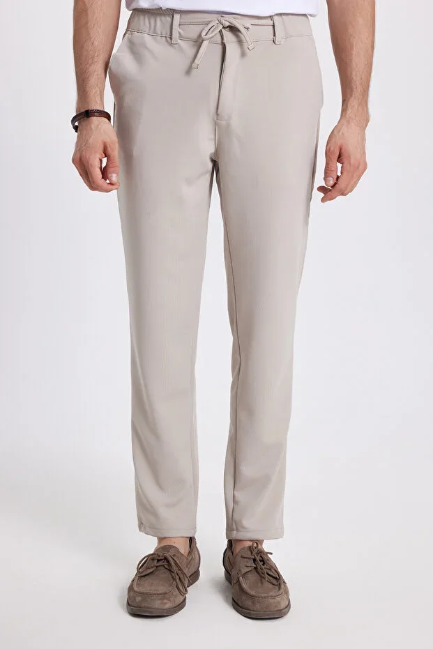 Men's Slim Fit Trousers with Elastic Waistband, Drawstring Detail, and Stone Wash
