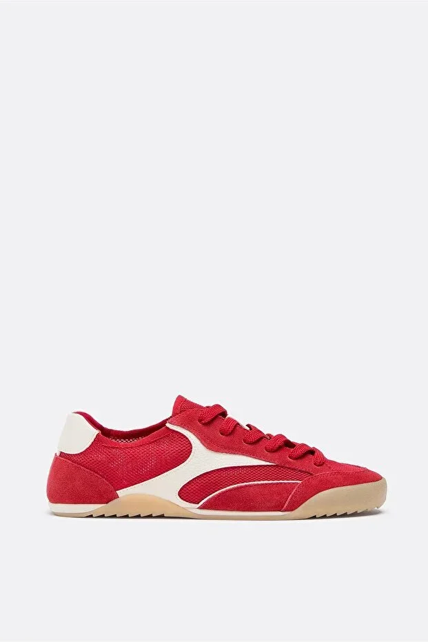 Perforated sneakers with leather details
