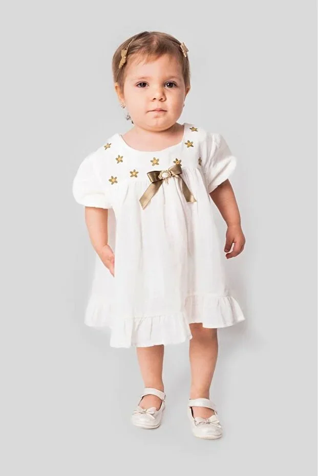 Girl's Muslin Dress with Brooch