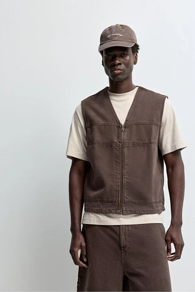 Faded effect denim vest
