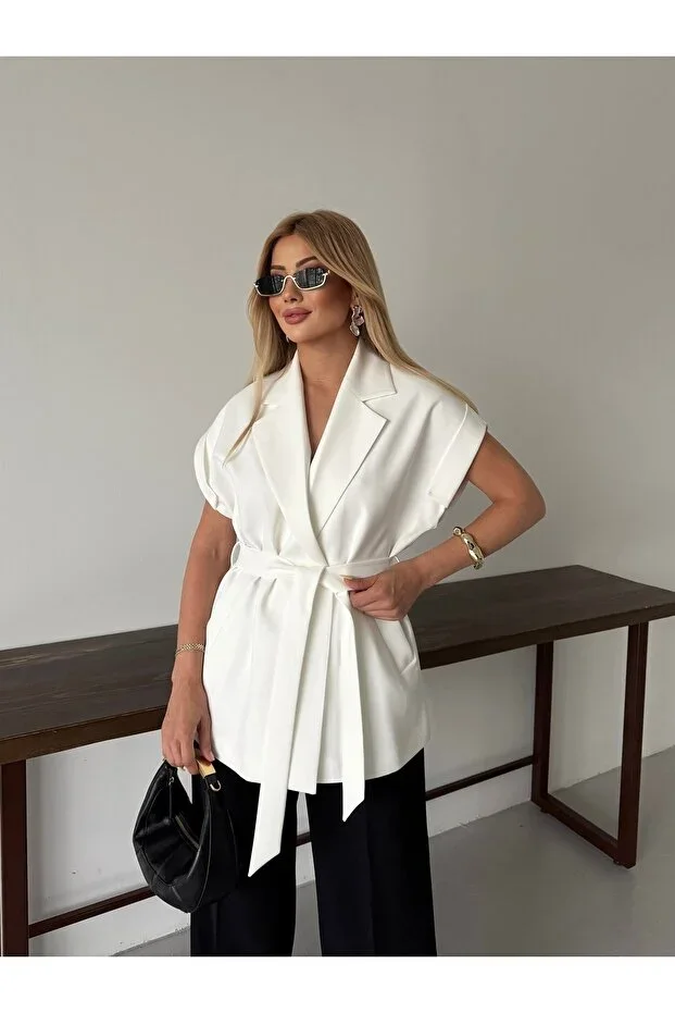 Low Sleeve Belted Vest