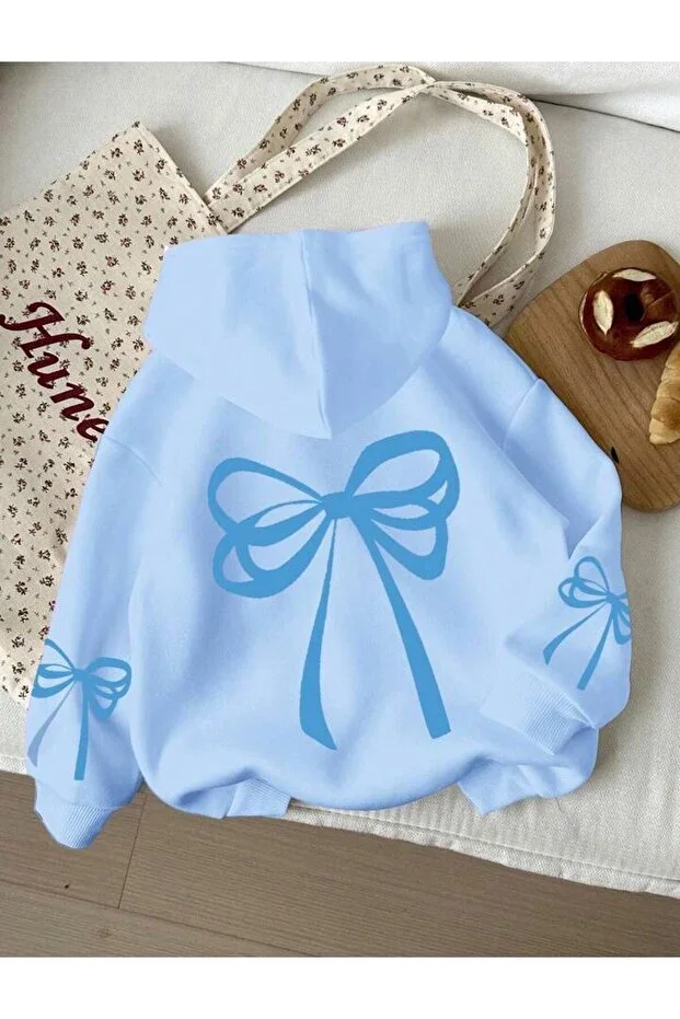 GIRLS HOODED SWEATSHIRT WITH BOW PRINT ON FRONT AND SLEEVES
