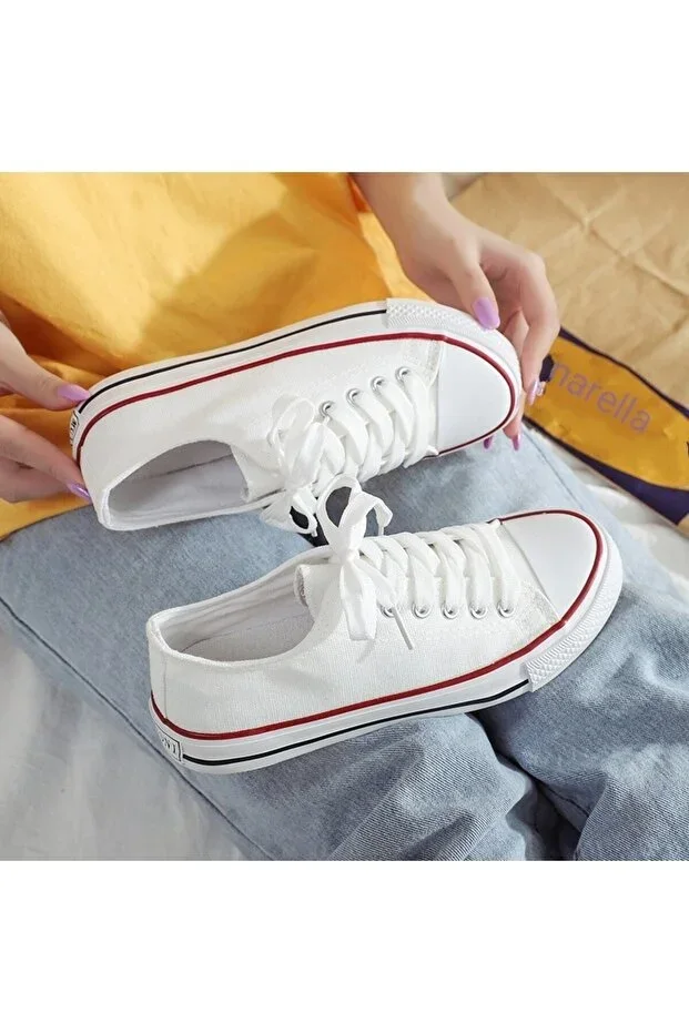 Unisex White Convers All Star Canvas Sneaker