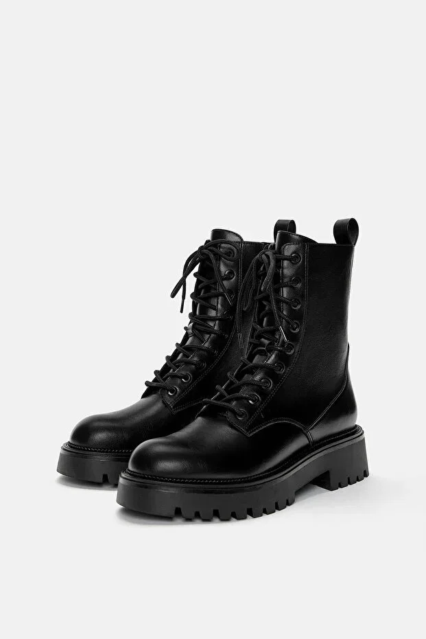 Lace-up flat boots